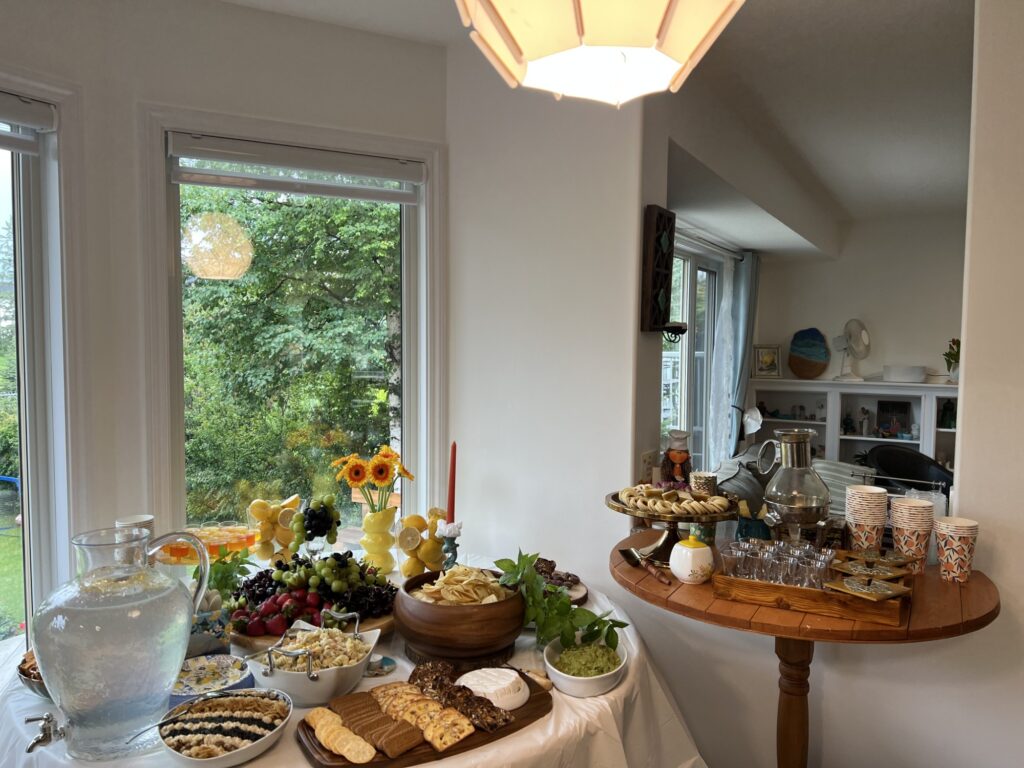Luxury candy bar dessert table in Calgary featuring Persian sweets, homemade lemonade, savory appetizers, cake pops, and custom lemon-themed birthday treats by Afsheed