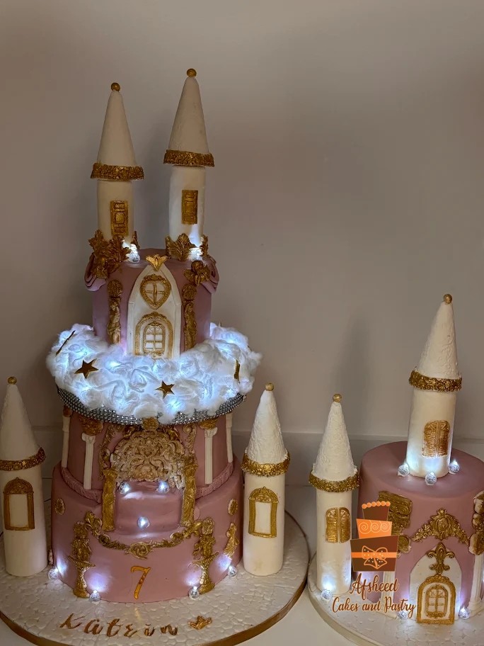 Labubu castle cake in pink and gold theme with multiple tiers and hand made edible decorations – Labubu Cake Calgary