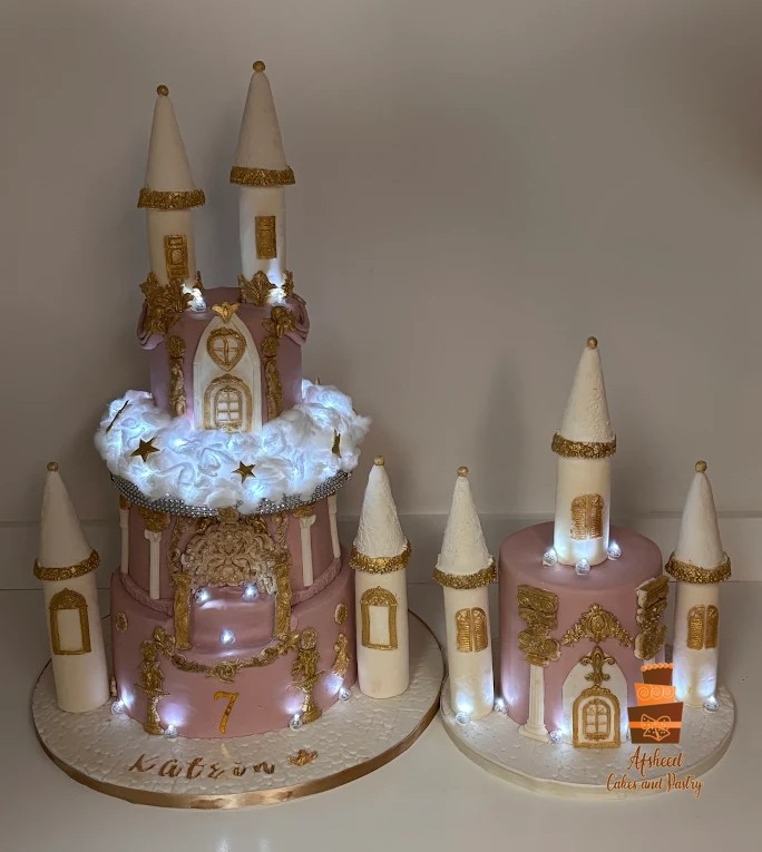 Custom Labubu Cake Calgary, pink and gold castle birthday cake with handmade details and Labubu dolls, perfect for luxury kids’ parties.