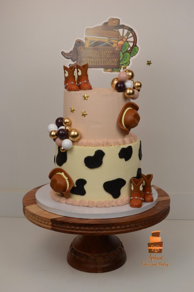 Calgary cowboy birthday cake featuring edible western details and decorations from a local vendor.