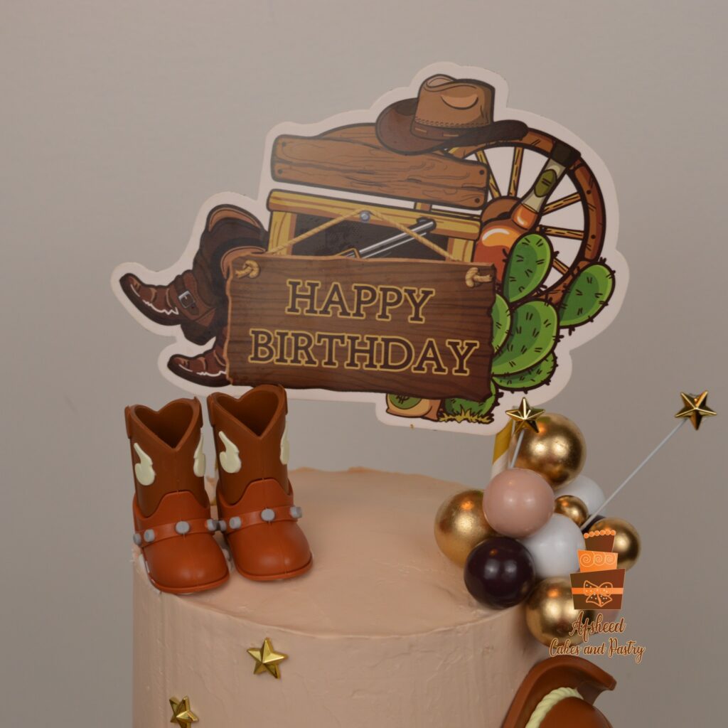 Western cowboy birthday cake collaboration using local Calgary decorations and handmade edible accents
