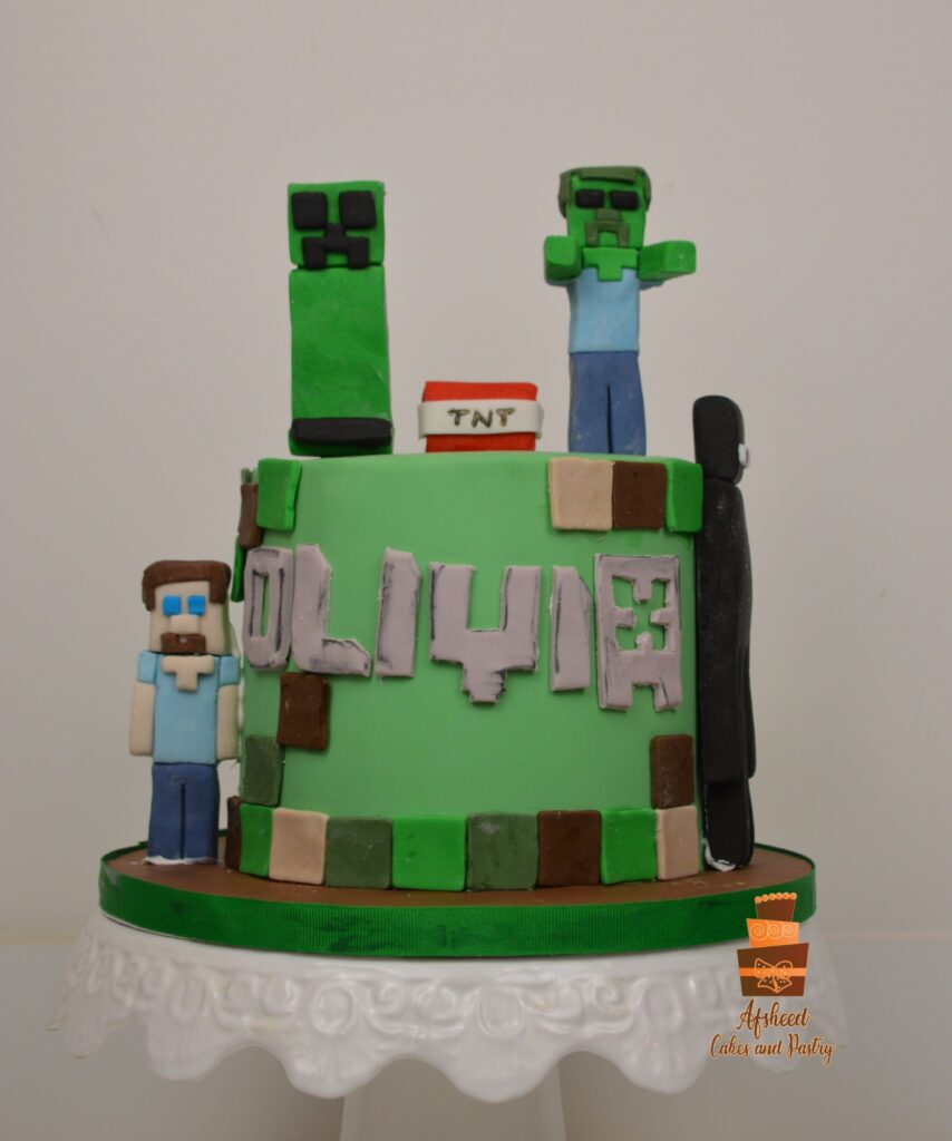 Custom Minecraft birthday cake with edible Creepers and TNT blocks handmade in Calgary by Afsheed Cakes
