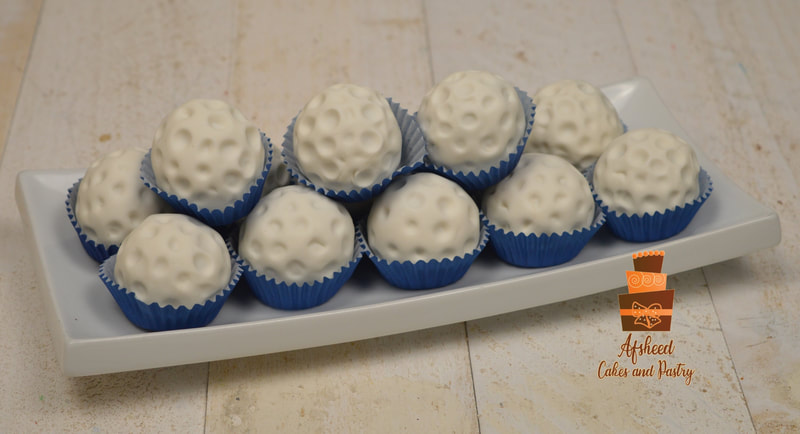 Cake pops in form of edible golf balls, perfect for husband, father, son birthday party, or as a grooms treat form your wedding